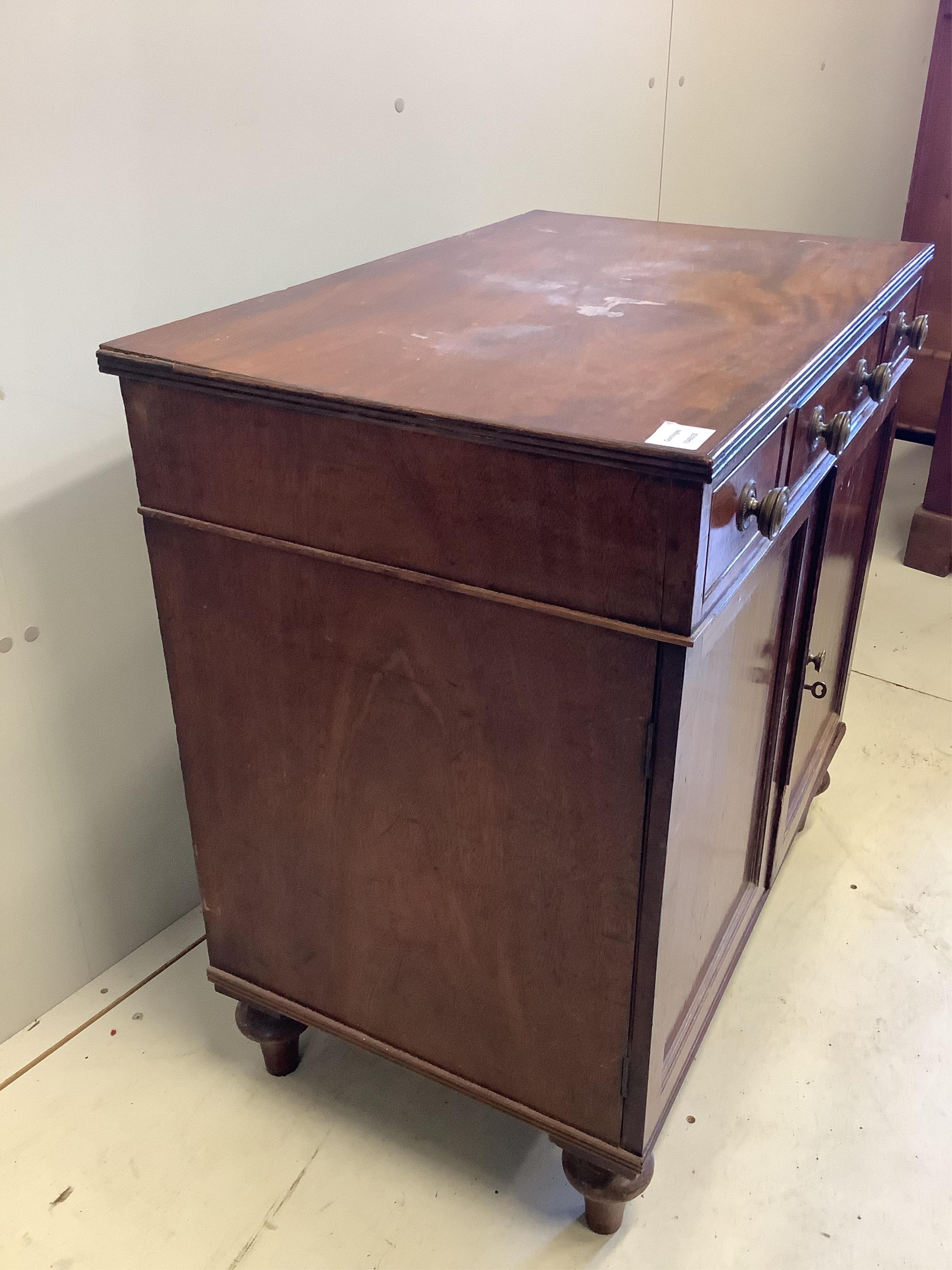 A small Regency mahogany side cabinet, width 74cm, depth 47cm, height 76cm. Condition - fair